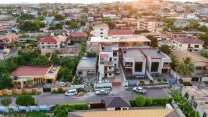 an aerial view of a small town with houses at Kana Apartments in Otinshi