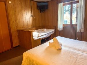 En eller flere senge i et værelse på Locanda del Lysjoch + 19 billeder