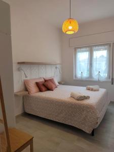 Giường trong phòng chung tại B&B La Coccinella