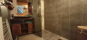 a bathroom with a sink and a mirror at L'Art'Home à Carnon Plage in Mauguio +15 photos
