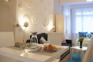 Posedenie v ubytovaní Concept Apartments