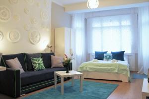 Posteľ alebo postele v izbe v ubytovaní Concept Apartments