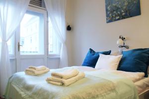 Posteľ alebo postele v izbe v ubytovaní Concept Apartments