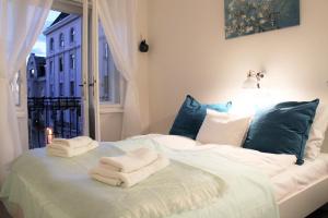 Posteľ alebo postele v izbe v ubytovaní Concept Apartments