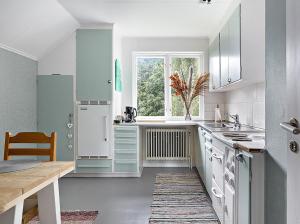Køkken eller tekøkken på Det Vita Huset Gubbhögen