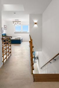 a room with a staircase and a bed at Heimerzheim-Hills in Swisttal