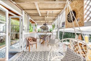 Et opholdsområde på Eden House - Beach Apartments & Suites