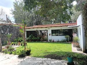 a house with a yard in front of it at Casa ixcanul in Montitlán