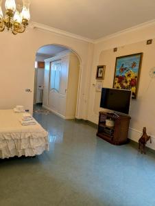 TV/trung tâm giải trí tại Davids Home +3 ảnh