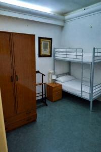 Giường trong phòng chung tại Davids Home