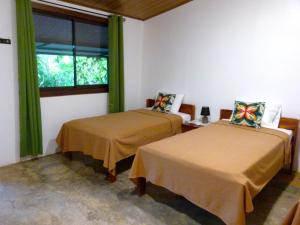 Krevet ili kreveti u jedinici u objektu Nicoya Silvestre