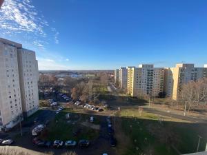 an aerial view of a parking lot in a city at Nagyerdő Naplemente Apartman Debrecen in Debrecen