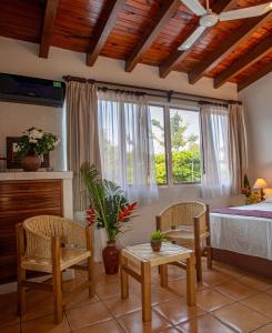 En eller flere senge i et værelse på Hotel Zandoyo Bed & Breakfast