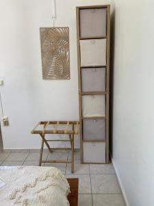 a room with a desk and a table and a chair at Appartement l'écrin in Saint-Claude