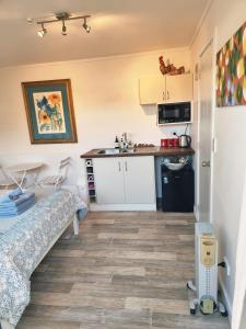 Kuchyň nebo kuchyňský kout v ubytování Sun Republik Studio