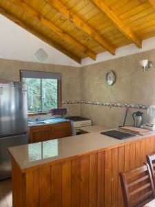 Køkken eller tekøkken på cabañas walls 1