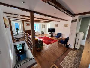 an overhead view of a living room and dining room at Avenue 15 Boudry Suites and Studio in Boudry
