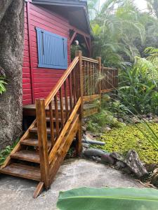 En have udenfor Le MORNE Aux F0US Cabanes & Jardin Tropical