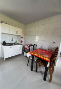 Køkken eller tekøkken på Casa de praia familiar a 1km do mar