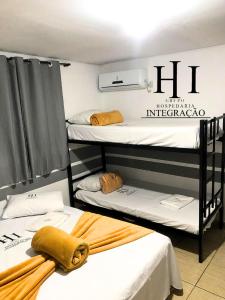 Giường trong phòng chung tại Hospedaria Ipiranga +18 ảnh
