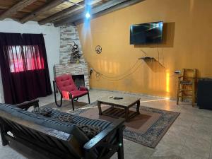 Et tv og/eller underholdning på Alquiler temporario Marcos