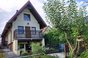 a house with a gambrel roof at Chata Vrcov in Vrcov