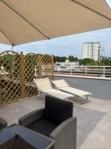 En balkon eller terrasse på The Three Diamonds - B&B CESENATICO