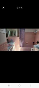 a picture of a kitchen with a bath tub at Very large room in Montreal