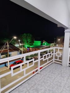 a view from the balcony of a building at night at Pousada do Centro in São Gabriel