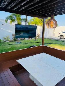 En eller flere senge i et værelse på PF Lounge - Praia do Forte e Imbassaí 3km