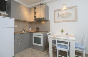 Kuchyň nebo kuchyňský kout v ubytování Apartments Krvavica + 7 fotografií
