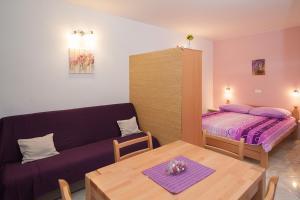 Postel nebo postele na pokoji v ubytování Apartments Krvavica