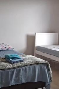 a close up of a bed in a room at Recanto do Daniel in Irati