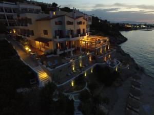 an aerial view of a building next to the water at Kekrifalia Hotel in Skala