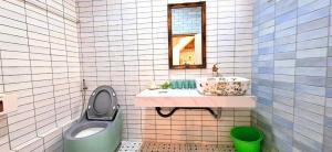 Et badeværelse på 沐時光民宿