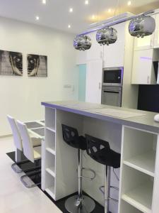 A kitchen or kitchenette at Synagogue Gozsdu Private Apartments