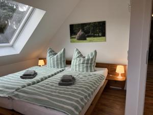 En eller flere senge i et værelse på Zur Mühle