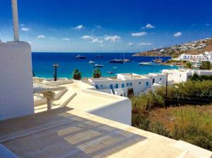 a view of the ocean from a house at Manos Studios in Platis Gialos