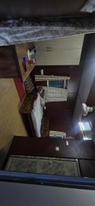 an overhead view of a room with a bed at Nishatana Farm Stay in Bangalore