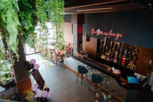 an overhead view of a restaurant with a bar at Prudential Hotel Nepal in Kathmandu