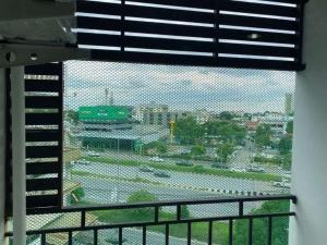 a window with a view of a city at Chiang Mai view place in Ban Hua Phrong