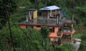 a house on the side of a hill at K2k homestsy in Rhenok