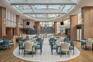 En restaurant eller et andet spisested på Fairfield by Marriott Beijing Capital Airport