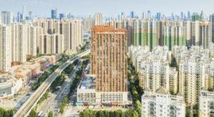 een luchtfoto van een stad met hoge gebouwen bij Lavande Hotel Wuhan Houhu Avenue Xingye Road in Wuhan
