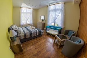 Posteľ alebo postele v izbe v ubytovaní Apartament Zdrojowa 45