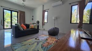 Et opholdsområde på Villa Lyn Kai Bae