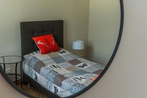 Posteľ alebo postele v izbe v ubytovaní Apartament Zdrojowa 45
