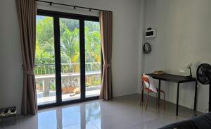 Et opholdsområde på Villa Lyn Kai Bae