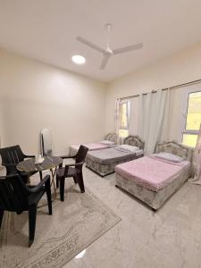 Postel nebo postele na pokoji v ubytování mandegar guest house + 17 fotografií