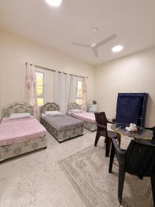 Postel nebo postele na pokoji v ubytování mandegar guest house